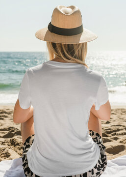 Beautiful Woman In Panama Hat Chilling At The Beach Back View