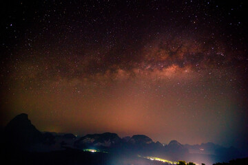 Abstract background of celestial stars, blurred wallpaper of the Milky Way at night, is a natural beauty. Seen during the time of the season