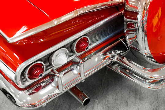 rear chrome bumper with red retro car headlights