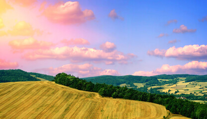 Obraz premium View of the low mountains with a beautiful sky.