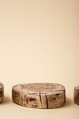 abstract round wooden platform on beige background, Empty showcase for presentation of cosmetic products, pedestal, mock up, copy space