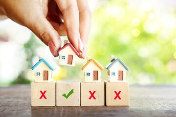 hand choosing best, right house, buying new home , real estate concept