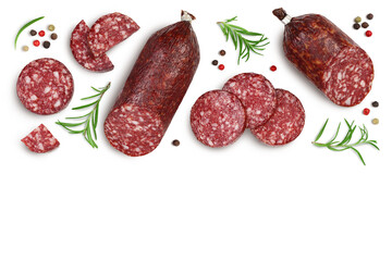 Smoked sausage salami with slices isolated on white background with clipping path. Top view with copy space for your text. Flat lay