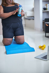 Mindful young lady using her morning time to exercise