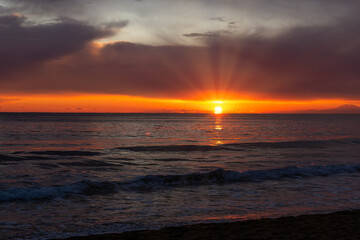View of a sunset over a sea.
