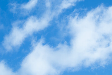 Obraz premium Background of blue sky with white clouds