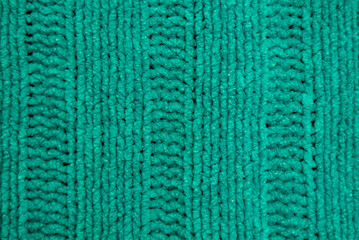 texture of knitted fabric close up. rough weaving