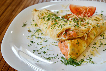 Pancake with Salmon and cream cheese. Close-up, selective focus