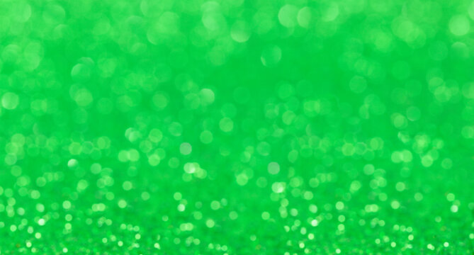 Green holiday bright defocused glitter background	