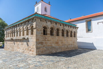 Exterior view at the Domus Municipalis, a Romanesque civic architecture building, an eloquent...