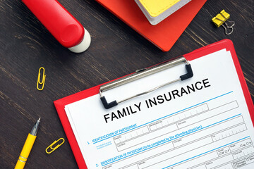 Business concept about FAMILY INSURANCE Application Form with inscription on the bank form