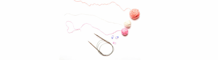 Color yarn balls and knitting needles
