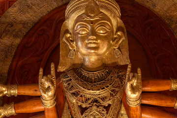 Goddess Durga idol in close up with blessings hand