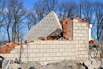 Fragment of the destroyed wall after the earthquake.