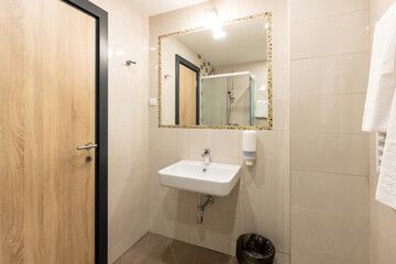 Fototapeta na wymiar Bathroom interior with shower cabin