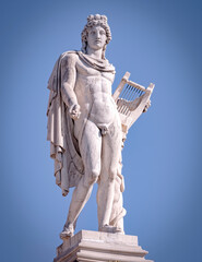 Apollo white marble statue and blue sky, Athens Greece