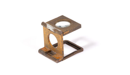 Old foldable dirty magnifying glass