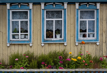 Fototapeta na wymiar Log Cabin with Garden in Urals