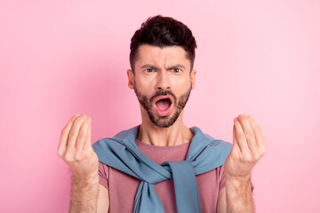 Photo of shocked crazy amazed surprised man asking money with open mouth isolated on pink color...