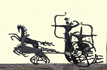 Obraz premium Nomad warriors on a chariot with a bow in their hands.