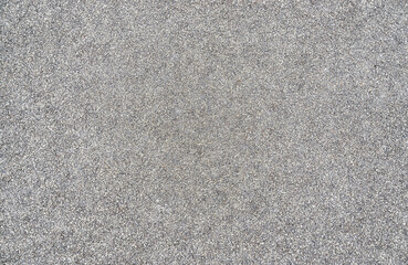 Gray granite background from small stones.