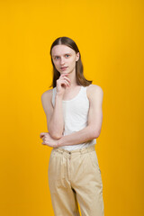 Androgynous beautiful young man. Model tests in studio.