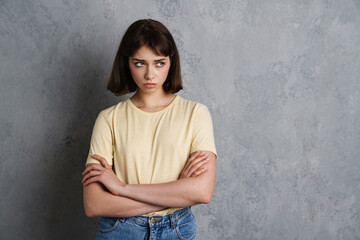 Portrait of an upset young woman standing