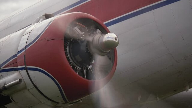 Close-up Propeller Plane Radial Engine Start. Aircraft Motor Turn Rotate Pistons and Blades. Small Private Footage of Old Chrome Details Airplane. Powerful Aircraft Steel Engine in Working Retro Plane