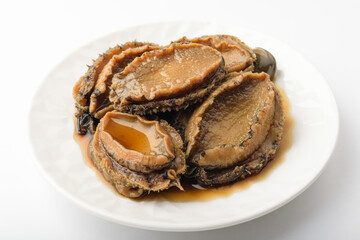 Fototapeta na wymiar Pickled abalone in soy sauce on a white background
