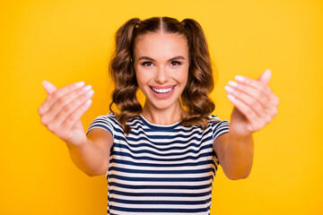 Photo of adorable sweet young woman wear striped clothes open arms invite you hugging isolated yellow color background