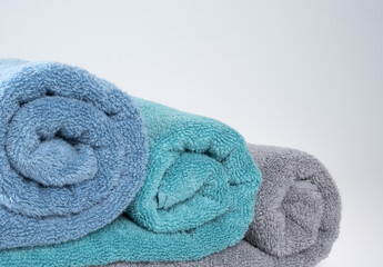 colored towels on a white background