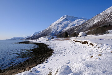 Lofoten Islands coast and mountains with snow, Lofoten, North Norway