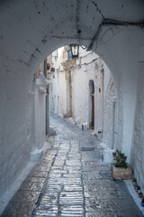 narrow alley of Ostunis oldtown, Puglia
