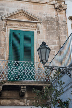 latern in a narrow alley of Ostunis oldtown, Puglia