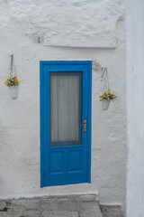 Fototapeta na wymiar blue door of Ostunis oldtown, Puglia