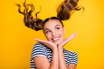 Photo of charming cute young lady dressed striped outfit wind blowing arms chin looking empty space...