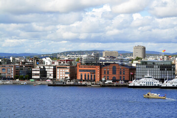 Panoramic top view of the promenade with modern buildings. Beautiful seascape in a summer day, Oslofjord, Oslo, Norway.