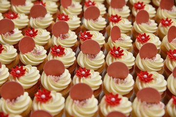 Top view of cupcakes. Cupcakes with paper cards in a box. Confectionery concept.