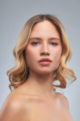 Fototapeta premium Pretty lady with clear skin posing with no makeup.