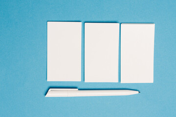 blank business cards on blue background mockup Copy space