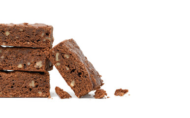 stack of baked chocolate brownie pieces with walnut isolated on white background, delicious dessert