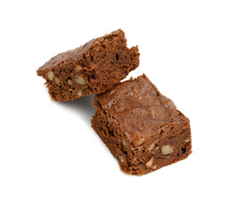 two baked chocolate brownie pie slices isolated on white background