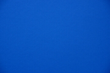 Paper, cardboard background. High resolution paper texture. Colored Blue background.