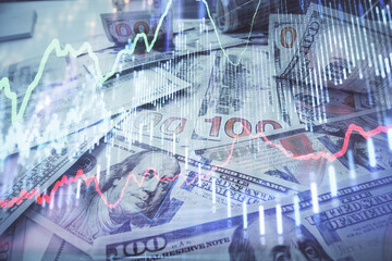 Obraz premium Multi exposure of forex chart drawing over us dollars bill background. Concept of financial success markets.