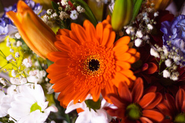 Colorful flower bouquets with diverse flora as a gift to women. Roses, daisies and other flowers. Spring