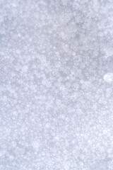 Obraz premium The texture of soap foam with small bubbles.