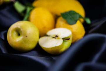 yellow fruit on a black background