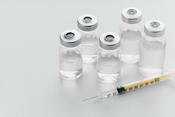 syringe and medicine bottle