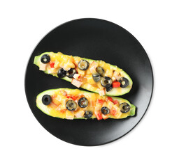 Plate of delicious stuffed zucchini on white background, top view