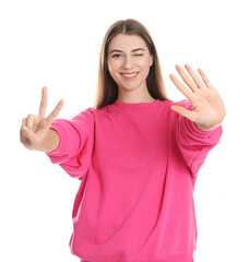 Woman showing number seven with her hands on white background